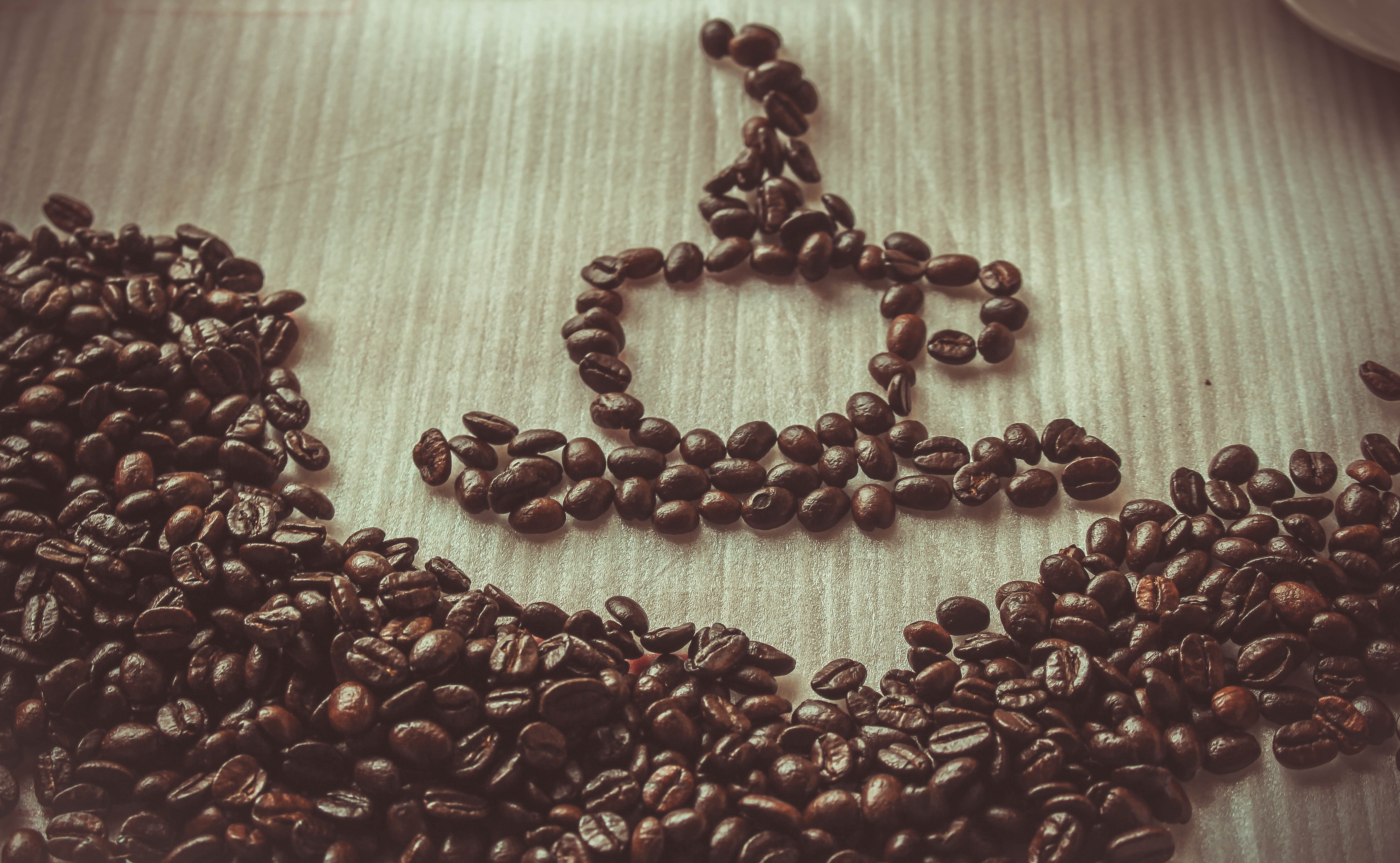 cup of coffee made of coffee beans